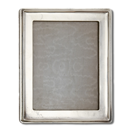 184 - A George VI silver photograph frame, backed on oak, 25.5 x 20cm, by A & J Zimmerman, Birmingham ... 