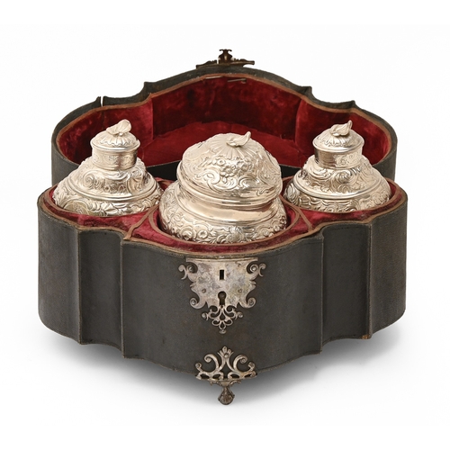 185 - A pair of George II Rococo silver tea caddies and sugar box,&nbsp;the ogee caddies and oval ogee box... 