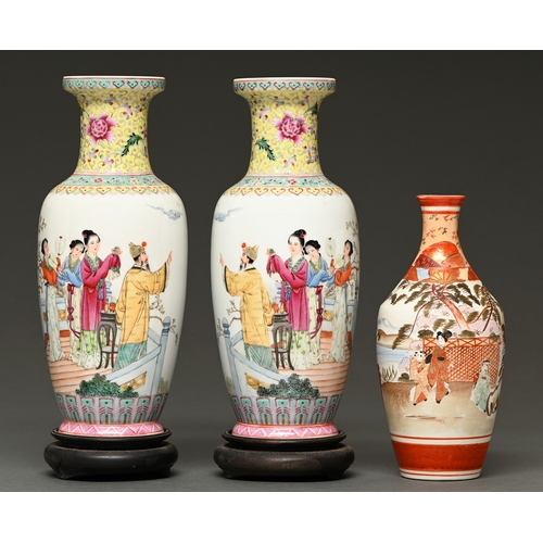 306 - A pair of Canton famille rose vases, 20th c, enamelled with a man and woman and their female attenda... 