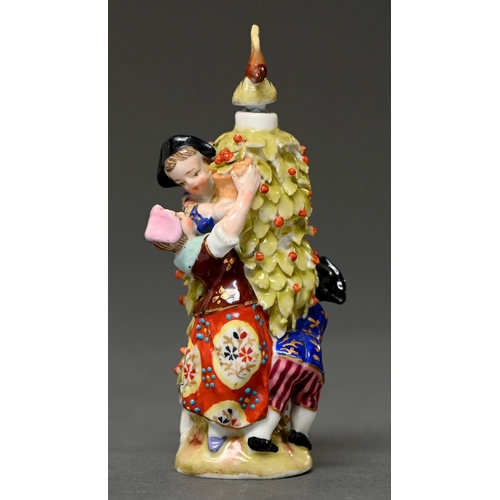 333 - A Sitzendorf figural scent bottle, late 19th c, derived from the Meissen Apple Pickers group, with b... 