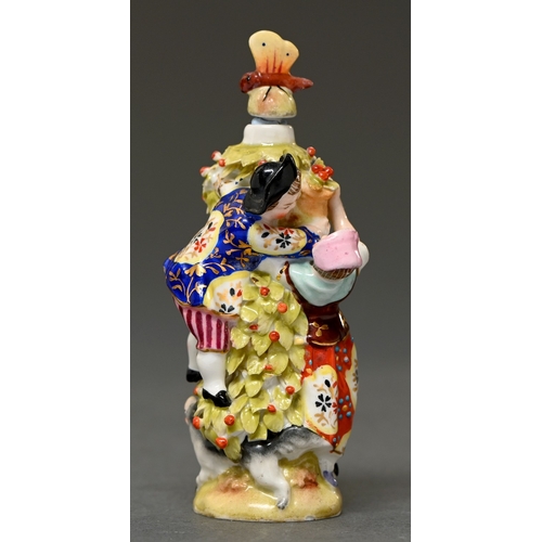 333 - A Sitzendorf figural scent bottle, late 19th c, derived from the Meissen Apple Pickers group, with b... 