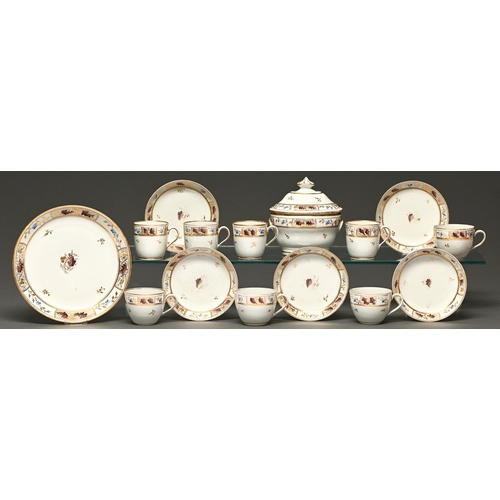 349 - A New Hall hard paste tea service, c1800, painted and gilt with alternating panels of grapes and blu... 