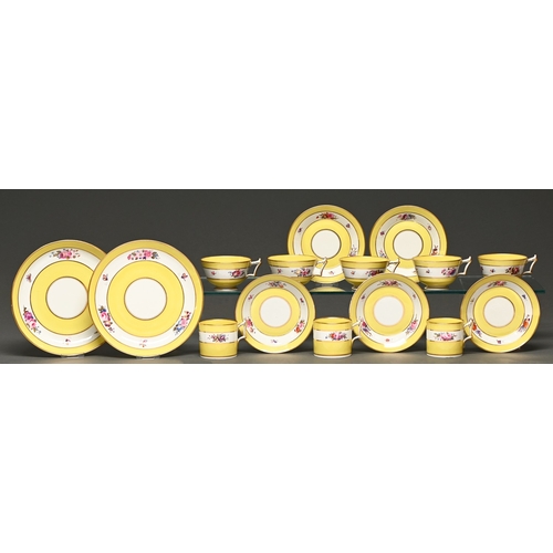 350 - A Flight, Barr & Barr tea service, c1825, painted with flowers reserved on a yellow ground, plat... 