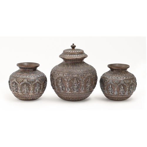 451 - A fine Indian copper and silver-applied garniture of water vessels, lota, c1900, chased with Hindu d... 