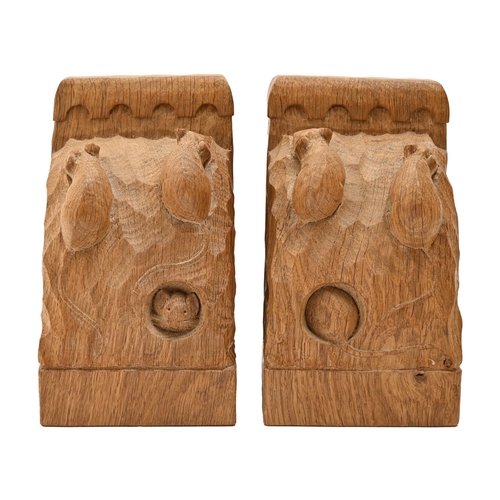 458 - A pair of Robert 'Mouseman' Thompson bookends, c1980, of adzed and carved oak, with three mice, one ... 