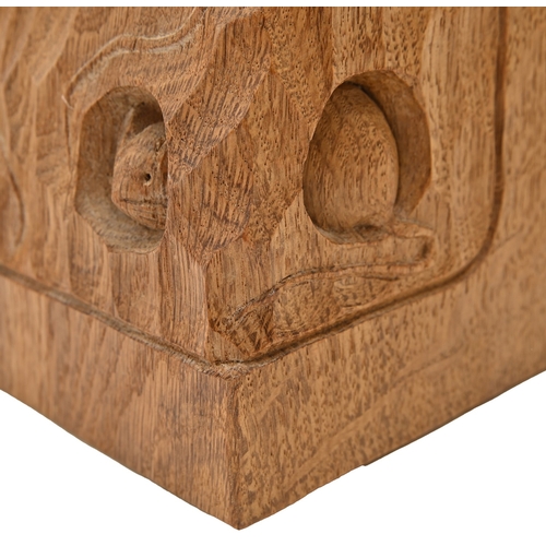 458 - A pair of Robert 'Mouseman' Thompson bookends, c1980, of adzed and carved oak, with three mice, one ... 