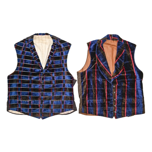 494 - Vintage clothing. Two gentleman's silk velvet waistcoats, c1850, with pockets, the front hem with le... 
