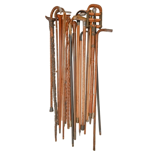 501 - Miscellaneous Victorian and later canes and walking sticks, to include bamboo shooting stick, a WWI ... 