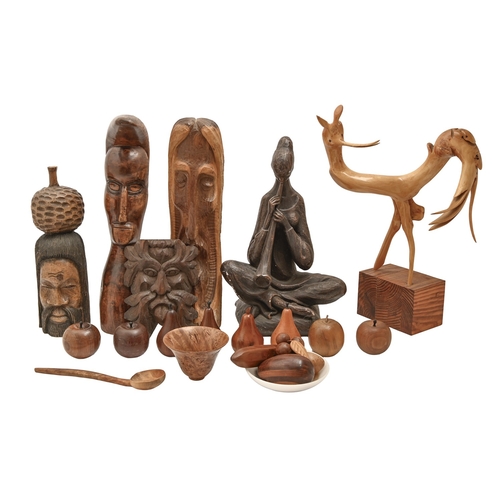 513 - Miscellaneous tribal art style wood carvings, including a carved oak head of the Green Man, a bronze... 