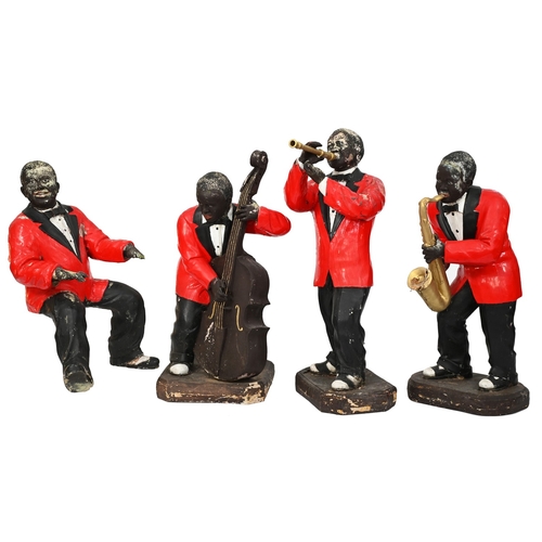 530 - A set of four resin sculptures of a New Orleans jazz band, 20th c, including double bass and saxopho... 