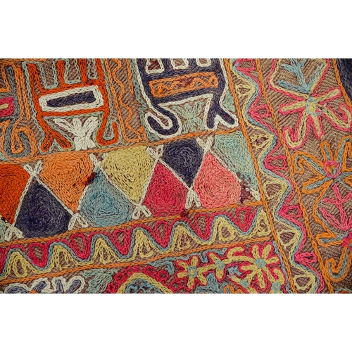 An Iraqi embroidered rug, 153 x 253cm