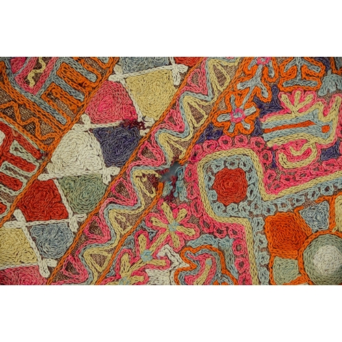 An Iraqi embroidered rug, 153 x 253cm