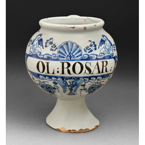 329 - A London Delftware wet drug jar, c1710-1730, of globular shape with flared spout, painted in cobalt ... 