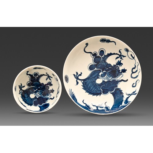 331 - A miniature porcelain teabowl and saucer, probably Lowestoft, c1775, painted in underglaze blue with... 