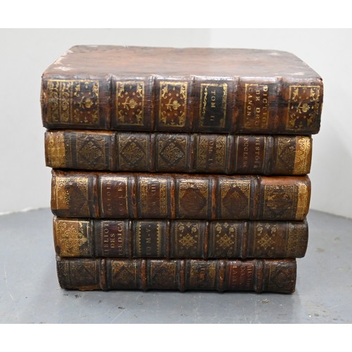 541 - A French liqueur set, the case formed from antique French gilt tooled leather bound books, with a pa... 