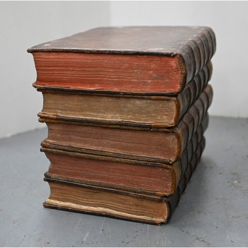 541 - A French liqueur set, the case formed from antique French gilt tooled leather bound books, with a pa... 