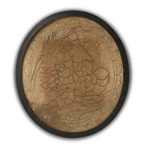 113 - A Regency map sampler of England and Wales, worked in coloured silk and wool on linen, oval 53cm... 