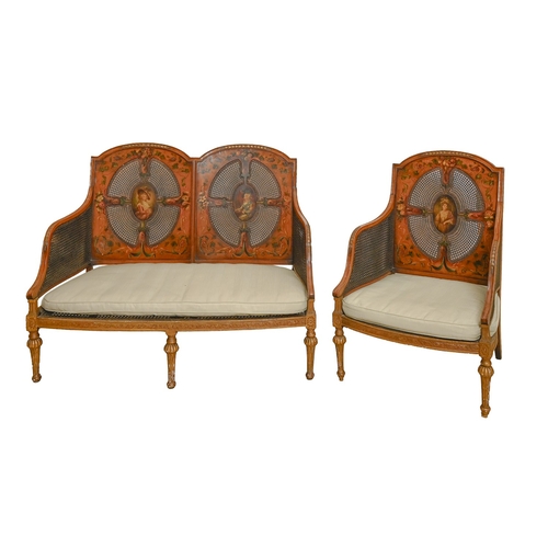 175 - A Victorian painted satinwood twin chair-back settee and bergère,  c1900,  the breakarched frame and... 