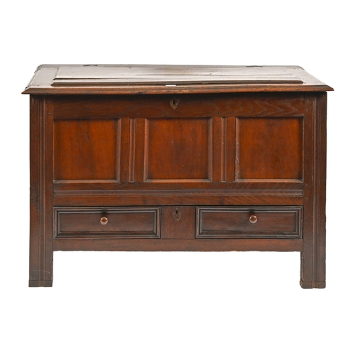 182 - A George II oak mule chest, the altered lid with ovolo lip above three plain panels and two moulded ... 