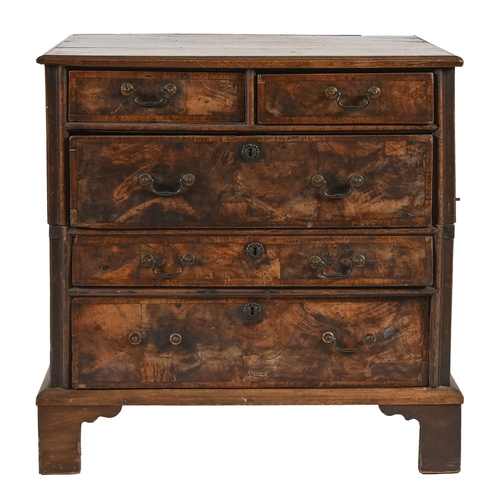 192 - An oak and walnut chest of drawers, early 18th c the moulded  top above two short and three graduate... 
