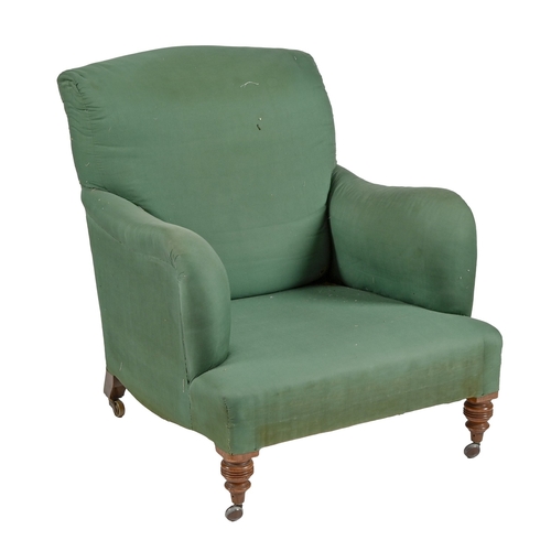 195 - A Victorian easy armchair, Howard of Berners Street, c1900 on turned or square walnut legswith brass... 