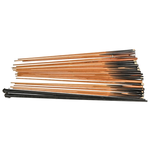 205 - Billiards and Snooker.  An Edwardian mahogany revolving cue stand,  with globe finials, on turned ba... 