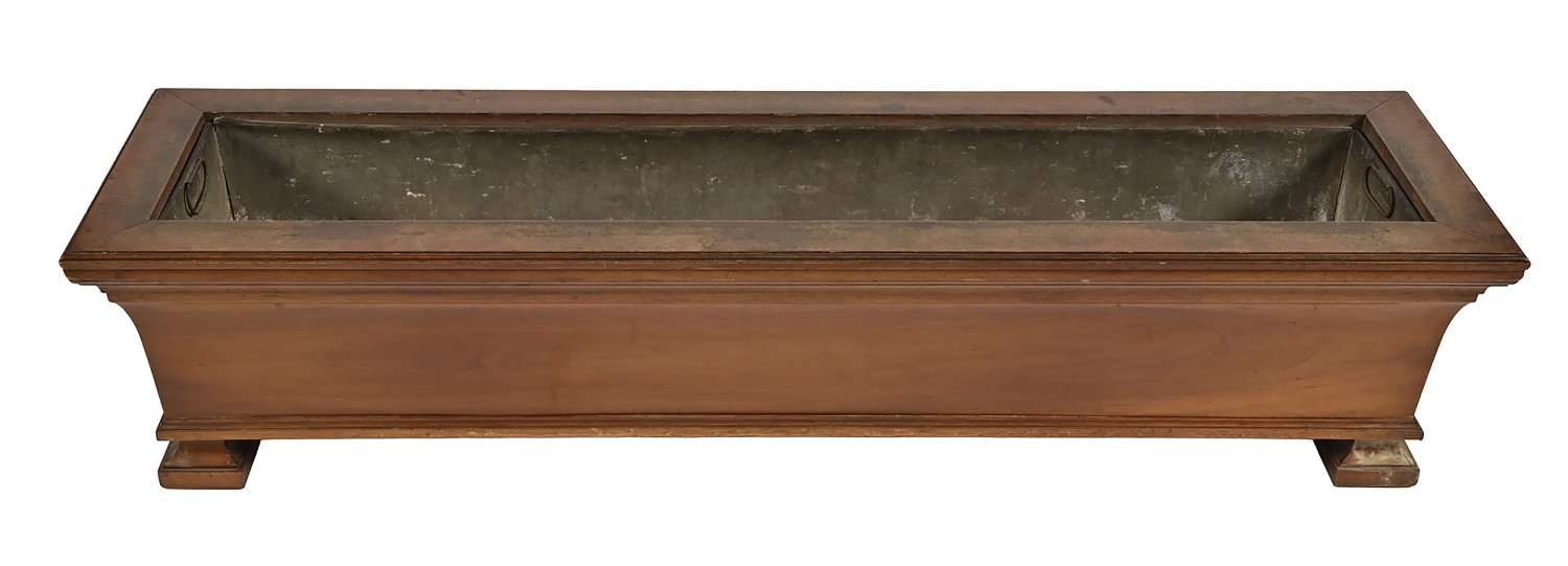 A Victorian mahogany jardiniere, of flared rectangular shape on block ...