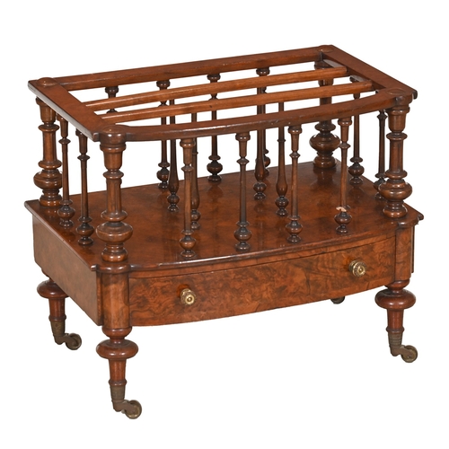 214 - A Victorian walnut canterbury,  bow fronted, on brass castors, 50cm h; 38 x 58cm