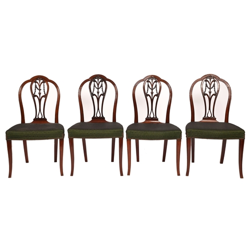 242 - A set of four George III mahogany dining chairs, with carved festoon splat, the seats covered in gre... 