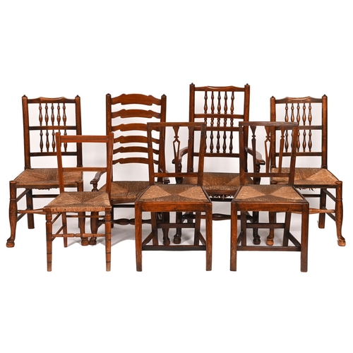 244 - Seven elm, ash and mahogany rush seated chairs, 19th c and later, including spindle back elbow chair... 