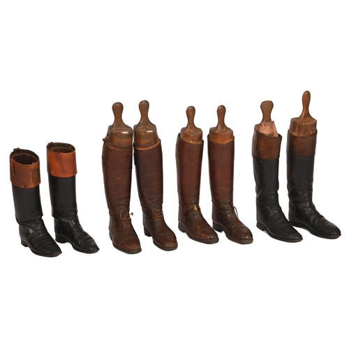 256 - Four pairs of brown and black leather gentleman's riding boots and a box of boot and shoe trees... 