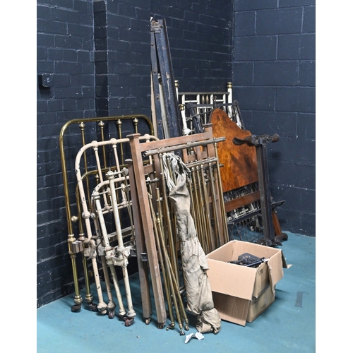 273 - Miscellaneous brass, painted iron and wooden bed ends and a walnut headboard