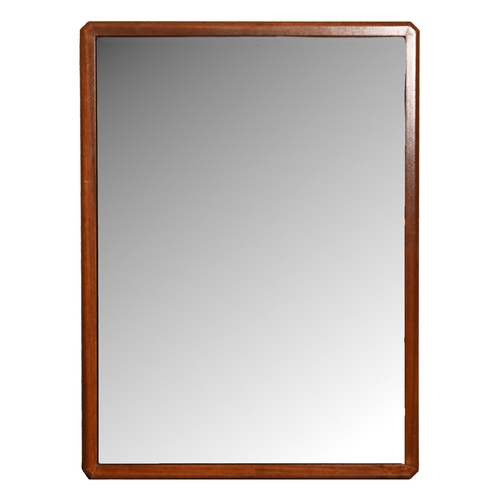 313A - A mid century teak veneered mirror, in octagonal frame, 92 x 67cm