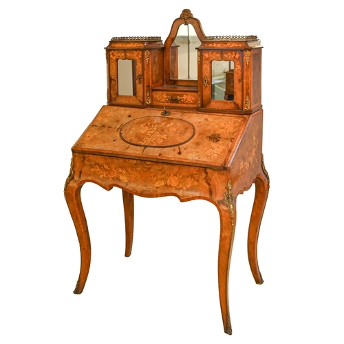 368 - A French ormolu mounted marquetry inlaid walnut bonheur de jour, on sabre legs, the upper section mo... 