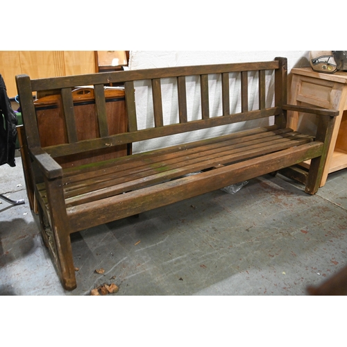 398 - A stained teak garden bench, seat height 42cm, overall width 183cm