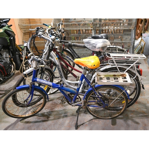 409 - A Dawes Sahara bicycle, a Batribike Diamond electric bicycle, a Triumph Trafficmaster bicycle and tw... 