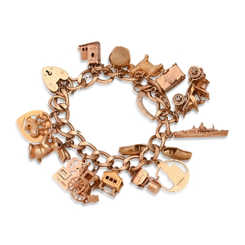 98 - A gold charm bracelet, with 9ct gold padlock and an extensive collection of gold charms, including o... 