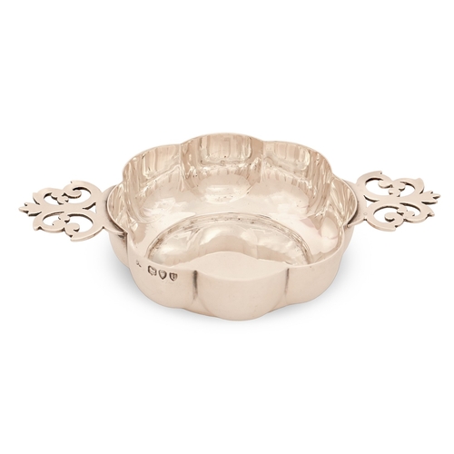 163 - A Victorian silver sweetmeat dish, of lobed shape with saw-pierced lug handles, 14cm h over handles,... 