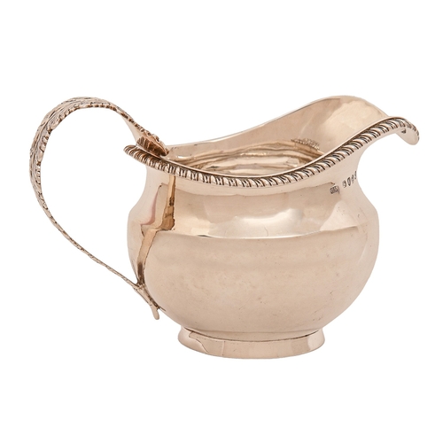 168 - A George IV silver cream jug, with acanthus handle and gadrooned rim, 9cm h, by George Knight, Londo... 