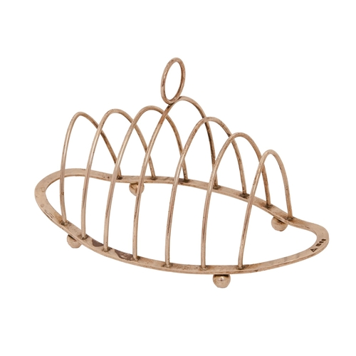 171 - An Elizabeth II silver seven-hoop toast rack, 18cm w, by J A Campbell, London 1979, 3oz 17dwt... 