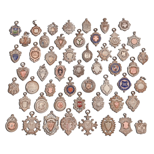 180 - A collection of fifty-two late Victorian and early 20th c silver prize watch fob shields, including ... 