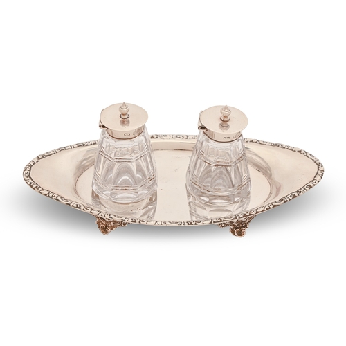 182 - A George V silver inkstand, with silver mounted cut glass inkwells, 19.5cm w, marks rubbed, Chester ... 