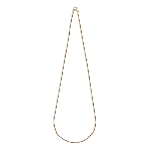 23 - A gold chain with pearls at intervals, early 20th c, 75cm l, marked 15C, 13.6g