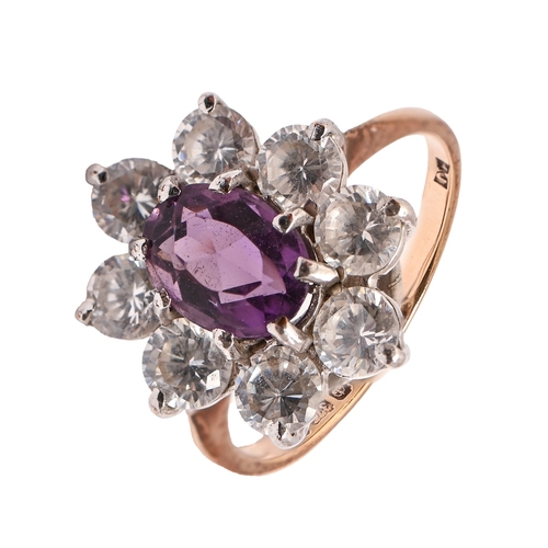 35 - An amethyst and white stone ring, in 9ct gold, London 1985, 2.6g, size J