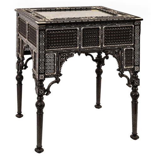 416 - An Ottoman ebony, teak, bone and mother-of-pearl bijouterie table, c1880, with bevelled glass inset ... 