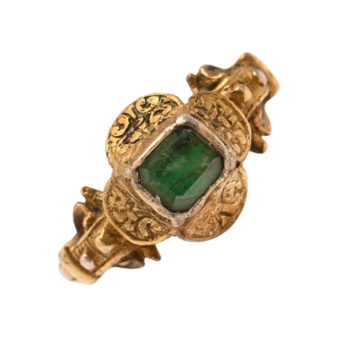 43A - A Spanish emerald and silver gilt finger ring, 16th c, the cut cornered and step cut emerald in a qu... 