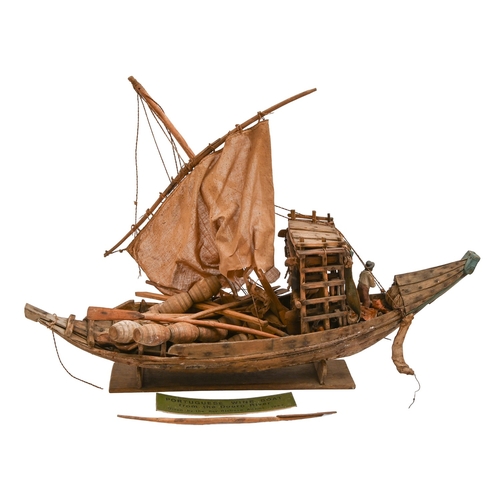 555 - A wooden model of a Douro River wine boat, built by Rev'd. Richard Adams, 1967, with sails and riggi... 