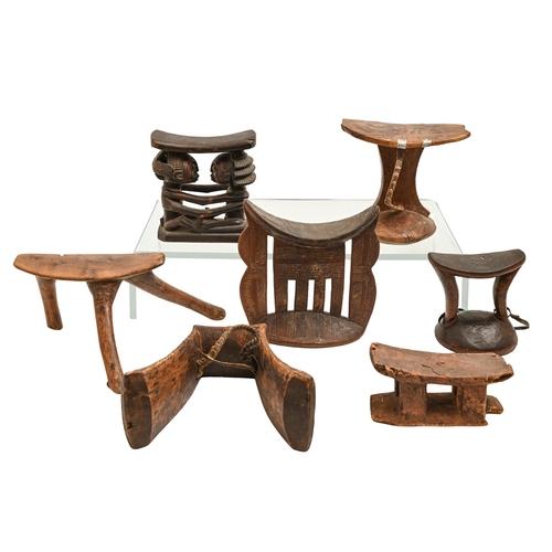 557 - Tribal art. Seven wood head rests, Africa, including Ethopia, Lobi, Luba and Turkana articles, large... 