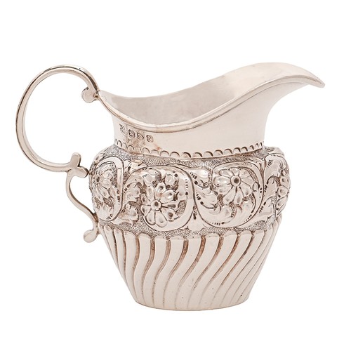 164 - A Victorian silver cream jug, Nathan & Hayes, Chester 1896, 2oz