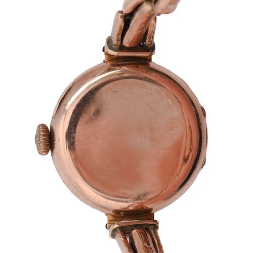 101 - A 9ct gold lady's wristwatch, 2.5cm diam, import marked, 1919, on expanding gold bracelet, 20g... 